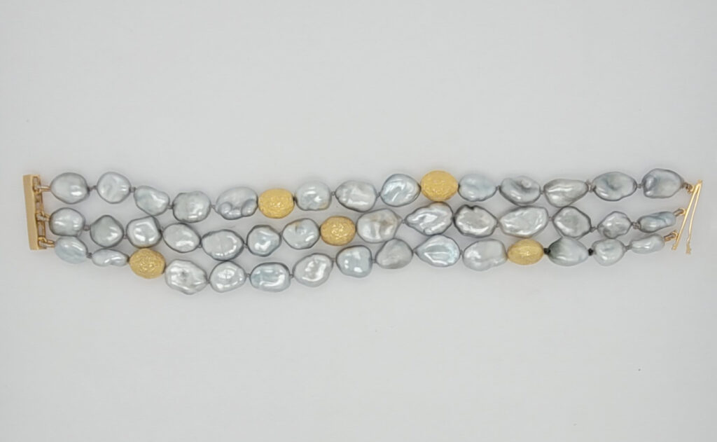 Three Rows of Silver Keshi Pearls & 18kt Yellow Gold Beads with 18kt Yellow Gold Tube Lock