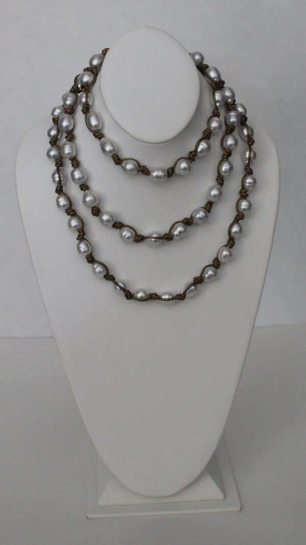 56" of 10.5mm-12.5mm White South Sea Pearls Knotted on Leather with 18kt Yellow Gold Chain & Clasp
