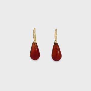 Vibrant red stone earrings featuring polished teardrop carnelian and 18kt yellow gold brushed wire, set against a white background