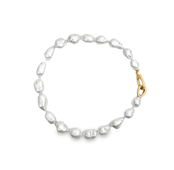 Baroque White South Sea Pearls finished with an 18kt Yellow Gold & Diamond Clasp